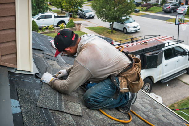 Professional Roofing technician working in Waltham, MA